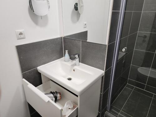 Koupelna v ubytování Davin City Aparments - Self-Check-In