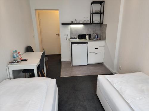 Postel nebo postele na pokoji v ubytování Davin City Aparments - Self-Check-In