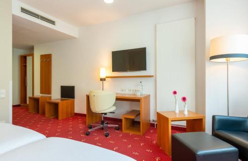 Et tv og/eller underholdning på Leonardo Hotel Berlin KU'DAMM