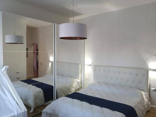 Postel nebo postele na pokoji v ubytování Island Suites Waterfront IUN R5783