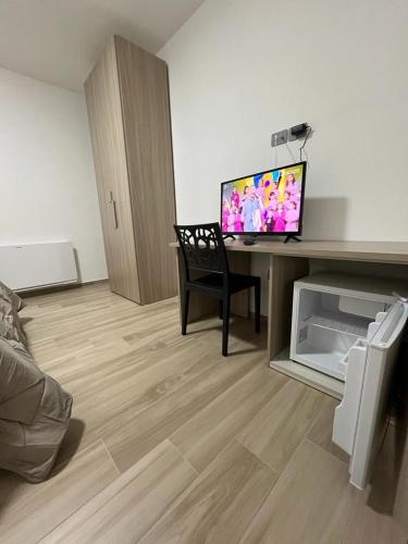 TV a/nebo společenská místnost v ubytování B&B La Terrazza Polifrone