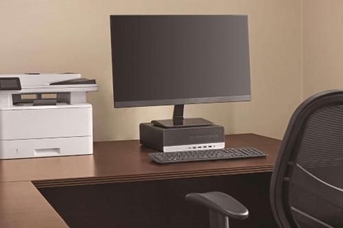 a computer monitor sitting on top of a desk at Country Inn & Suites by Radisson, Georgetown, KY in Georgetown