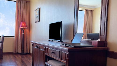 TV a/nebo společenská místnost v ubytování Pacific Hotel & Spa