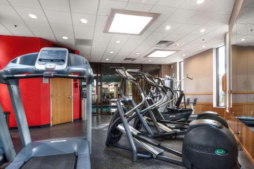 a gym with several exercise bikes in a room at Radisson Hotel Corning in Corning