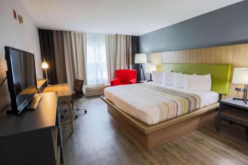Postelja oz. postelje v sobi nastanitve Country Inn & Suites by Radisson, Myrtle Beach, SC