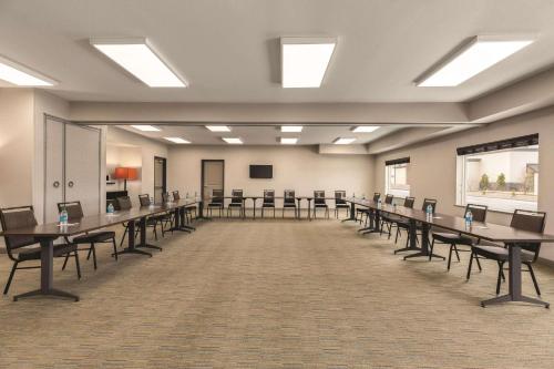 a large room with desks and chairs in it at Country Inn & Suites by Radisson, Lubbock Southwest, TX in Lubbock