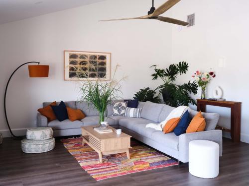 a living room with a couch and a table at Shawwood Estate in Mudgee