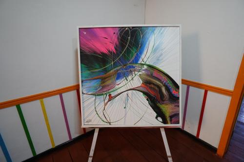 a painting of a peacock on a wall at Hotel Arte Santa Rosa in Santa Rosa de Cabal