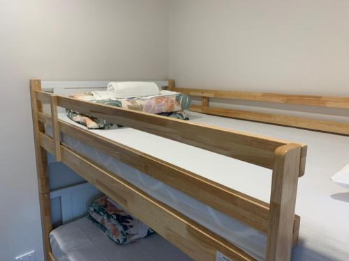 a couple of bunk beds in a room at Ballina Beach Nature Resort in Ballina
