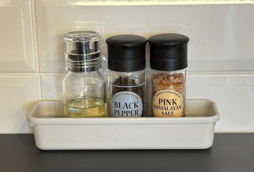 a white container filled with different types of spices at Hotel Dios - Vacation STAY 31424v in Awaji