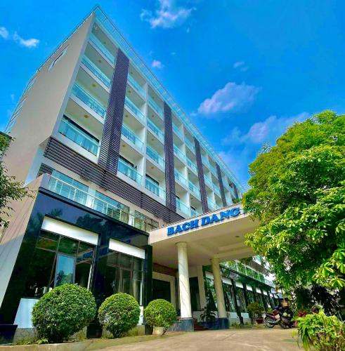 a building with a sign on the front of it at Bạch Đằng Hạ Long Hotel in Ha Long