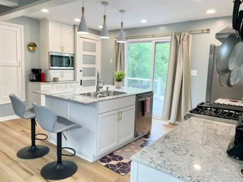 a kitchen with a sink and a counter top at Waterfront house near the Niagara Falls/Canal/Canadian Border in Tonawanda