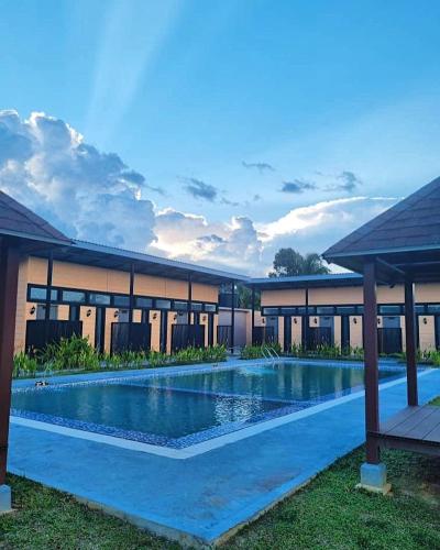 an image of a resort with a swimming pool at Laman Gadang in Johol