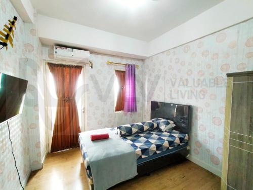 Ένα ή περισσότερα κρεβάτια σε δωμάτιο στο EASTON PARK APARTMENT by VLV RM