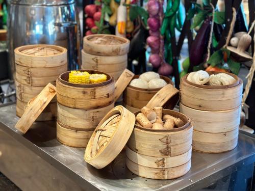 a bunch of wooden baskets sitting on a table at InterContinental Dalian, an IHG Hotel in Dalian