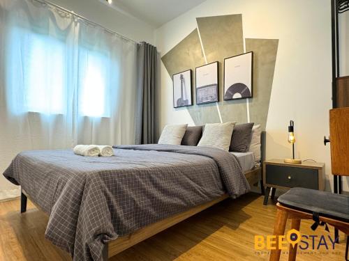 Postelja oz. postelje v sobi nastanitve Sensory Residence Dengkil by Beestay