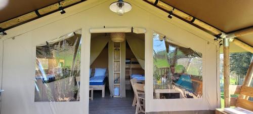an inside view of a house with a room at KNAUS Campingpark Hennesee in Meschede