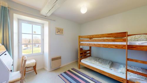 Postel nebo postele na pokoji v ubytování Gite La Dodiniere