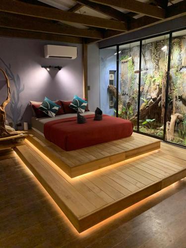 Rockinnest Hotel El Nidoにあるベッド