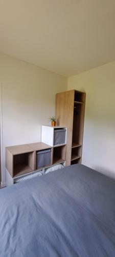 Ένα ή περισσότερα κρεβάτια σε δωμάτιο στο Au gîte perdu