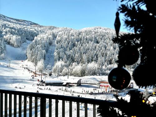 a view of a ski resort in the snow at Apartment Aurora in Bjelašnica