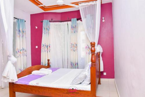 Ένα ή περισσότερα κρεβάτια σε δωμάτιο στο Jaanst Holiday Homes-Sunset