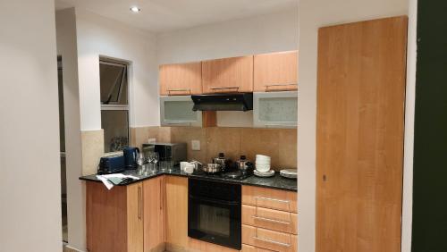 A kitchen or kitchenette at Sandhurst Towers