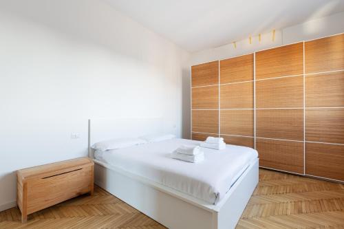 Ένα ή περισσότερα κρεβάτια σε δωμάτιο στο Elegant Milan Apartment in Restocco Area