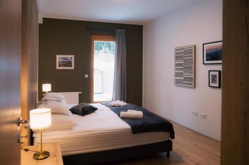 Postel nebo postele na pokoji v ubytování Peak Haven apartments, Pohorje