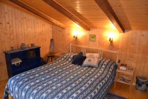 Postel nebo postele na pokoji v ubytování Alte typische Engadinermühle