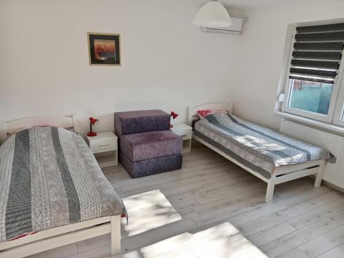 Voodi või voodid majutusasutuse APARTMAN “POD KRALJEVICOM” toas