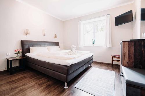Postel nebo postele na pokoji v ubytování Gasthof Greimel