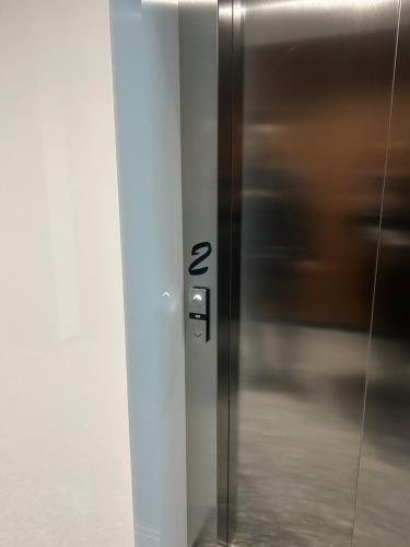 an elevator door with the number twentytwo on it at Anna-Sofia apartment in Sofia