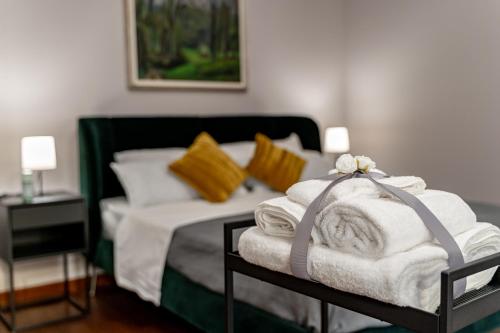 Ένα ή περισσότερα κρεβάτια σε δωμάτιο στο casa/studio Ricard Centro storico Arona
