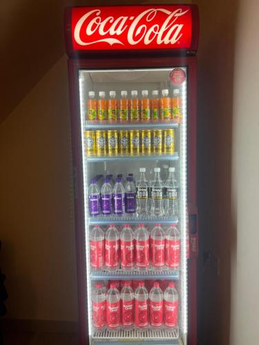 einem Coca-Cola-Kühlschrank mit Sodaflaschen in der Unterkunft The heaven(close to golden temple) in Amritsar