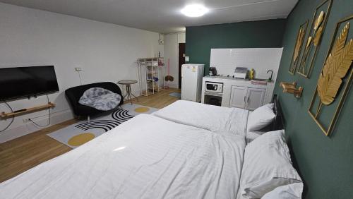 Letto o letti in una camera di อิมแพ็ค เมืองทองธานี ห้องเช่ารายวัน เมืองทอง popular condo C5