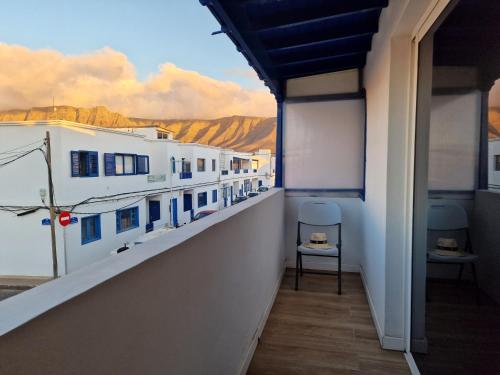 a balcony of a building with a view of the mountains at MALVASIA 5 in Famara