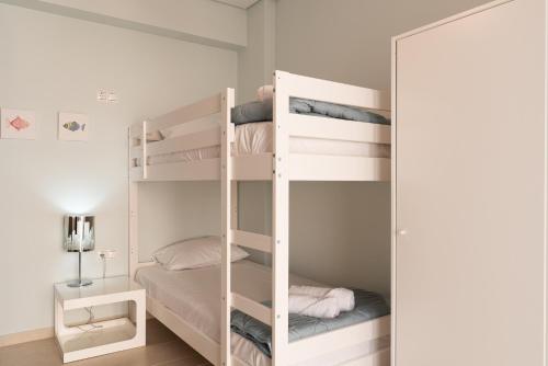 Ένα ή περισσότερα κρεβάτια σε δωμάτιο στο Palmasea Cozy 1stfloor 2br family ap in Stalis