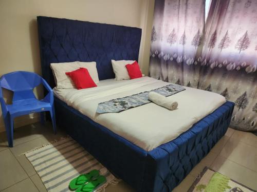 A bed or beds in a room at Prime Homes