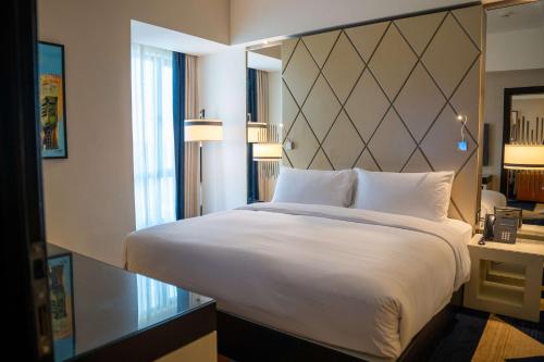 Postel nebo postele na pokoji v ubytování Hilton Amman