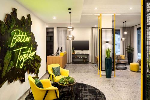 Et tv og/eller underholdning på Vienna House Easy by Wyndham Berlin Potsdamer Platz