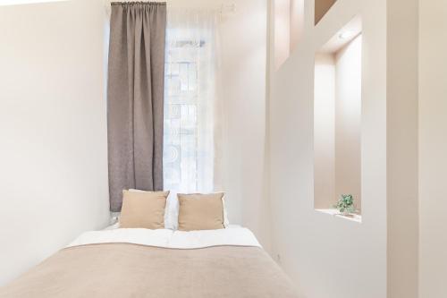 מיטה או מיטות בחדר ב-Central and Cute with 3 rooms and AC