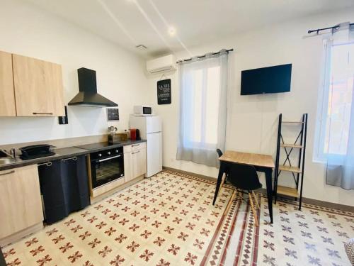 Η κουζίνα ή μικρή κουζίνα στο Studio confort pour 2 Perpignan Bir Hakeim