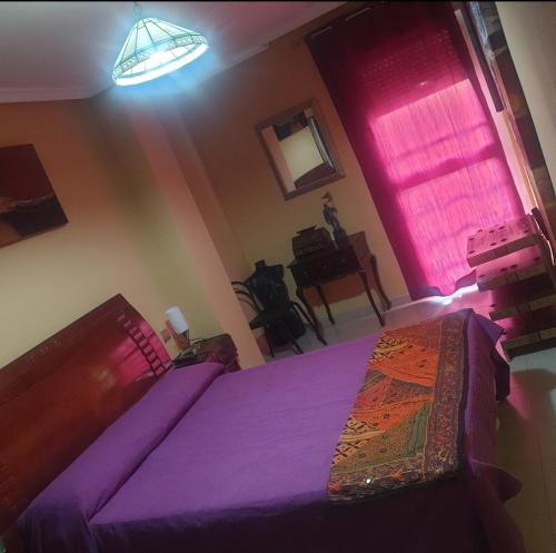 Postel nebo postele na pokoji v ubytování El MIRADOR DE LA PLAYA