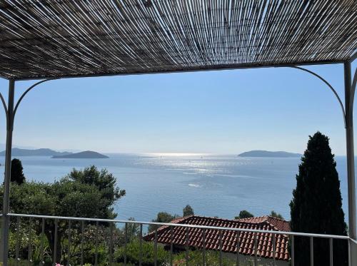 a view of the ocean from a house at Villa Athena Skiathos in Megali Ammos