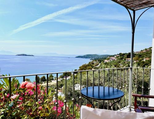 a balcony with a view of the ocean at Villa Athena Skiathos in Megali Ammos