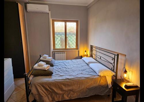 Postelja oz. postelje v sobi nastanitve Dream House Fiumicino