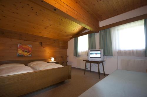 Säng eller sängar i ett rum på Dreiländerhaus