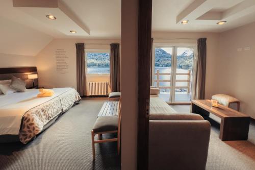 Ένα ή περισσότερα κρεβάτια σε δωμάτιο στο Hotel Puerto Blest