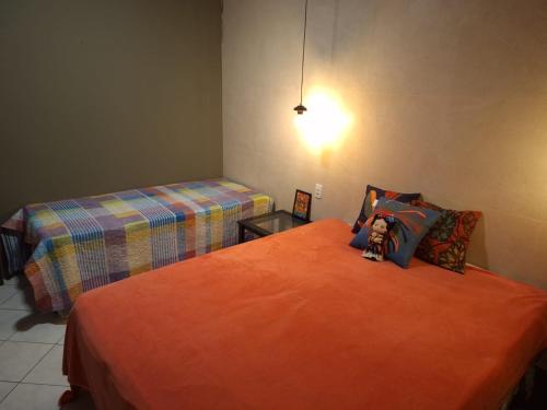 Giường trong phòng chung tại Casa Frida 2